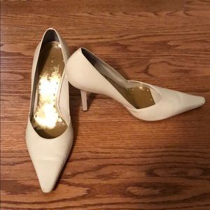 3 1/2 in cream heels.